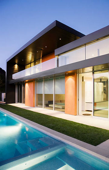 Small & Triangle Concrete House on lake